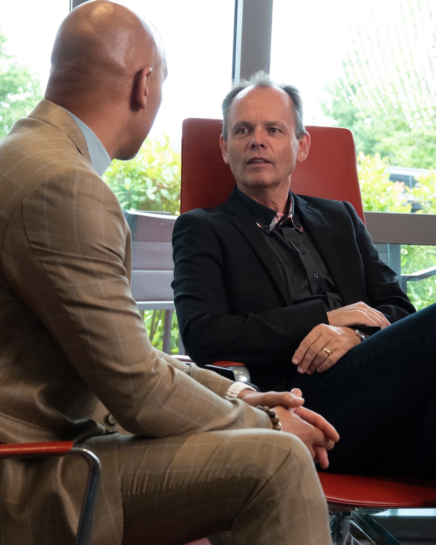 Hermann Ladner in conversation with a leader